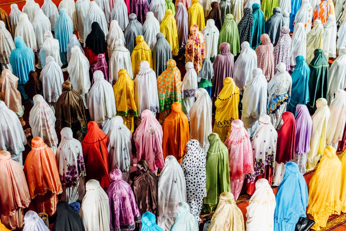 Muslim People praying in Istiqlal Mosque, Jakarta, Indonesia